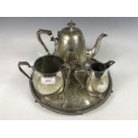 A Victorian electroplate three-piece tea service together with tray and sugar tongs