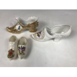 Two crested china shoes and similar