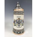 A German stoneware beer stein decorated with the arms of Imperial Germany