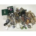 A quantity of vintage costume jewellery, including a sapphire and rolled-gold pendant necklace and