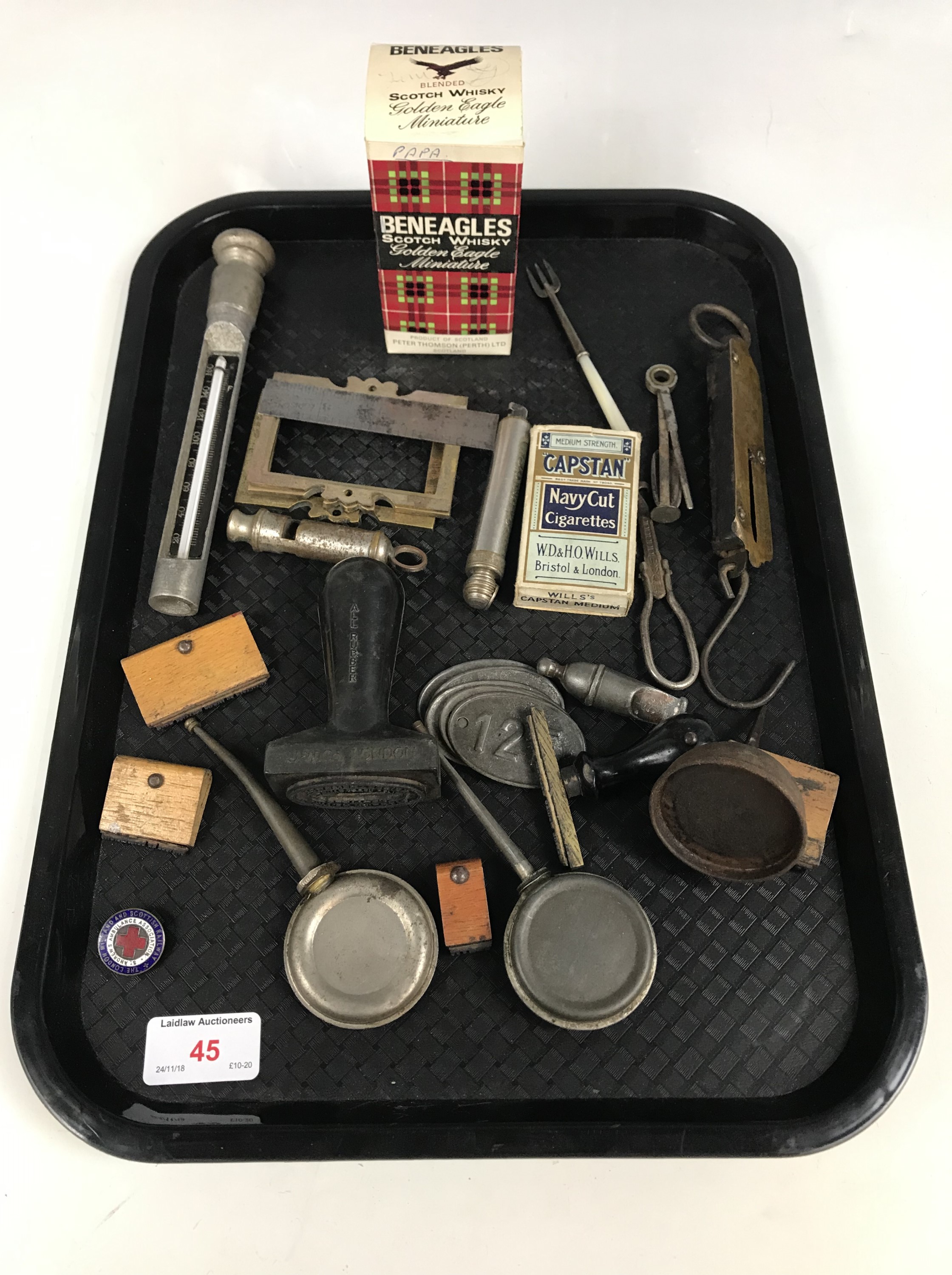 Sundry collectors' items including three small oil cans, an ARP whistle and a silver cocktail fork