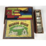 A 1930s Glevum Series wooden-cased set of 'Coloured and Polished Building Bricks' together with a