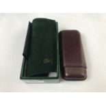 A Davidoff hide cigar case, (boxed as-new with papers)