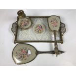 A 1930s gilt metal and petit-point dressing table set
