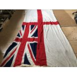 A large Royal Navy white ensign cotton flag of multi-piece construction