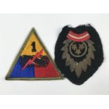 Two military cloth badges