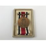 A police Faithful Service medal to Joseph H. Mann, in issue carton