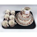 A vintage red and gilt porcelain tea set, pattern No. 6808