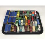 A large quantity of vintage Matchbox and Lesney die-cast model cars and wagons etc