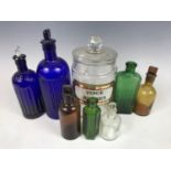 Sundry pharmacists bottles and a jar (jar a/f)
