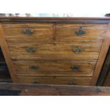 A Victorian walnut chest of drawers