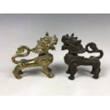 Two 20th Century Burmese brass chinthes / temple lions, 9 cm