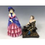 A Tuscan China figurine Bubbles (a/f) together with a Victorian lady figurine by Royal Doulton,