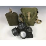 A British military gas mask and water bottle