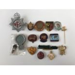 A quantity of vintage button and lapel badges