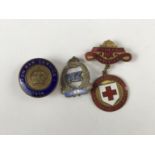 A Second World War 'On War Service' enamelled lapel badge, together with a County of Cumberland