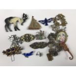 A quantity of vintage costume jewellery, including a paste brooches, bracelets and necklaces, a
