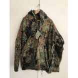 A Sturm Mil-Tec Cold Weather Camouflage Parka with Polar Fleece lining, size XL, new with tags