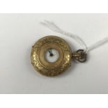A Victorian lady's high-carat yellow-metal half hunter fob watch, stamped 18K, having a white-