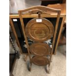 A 1920s mahogany folding cake stand