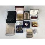 Compacts, trinket boxes and lighters, including a contemporary electroplate aide-memoire, a