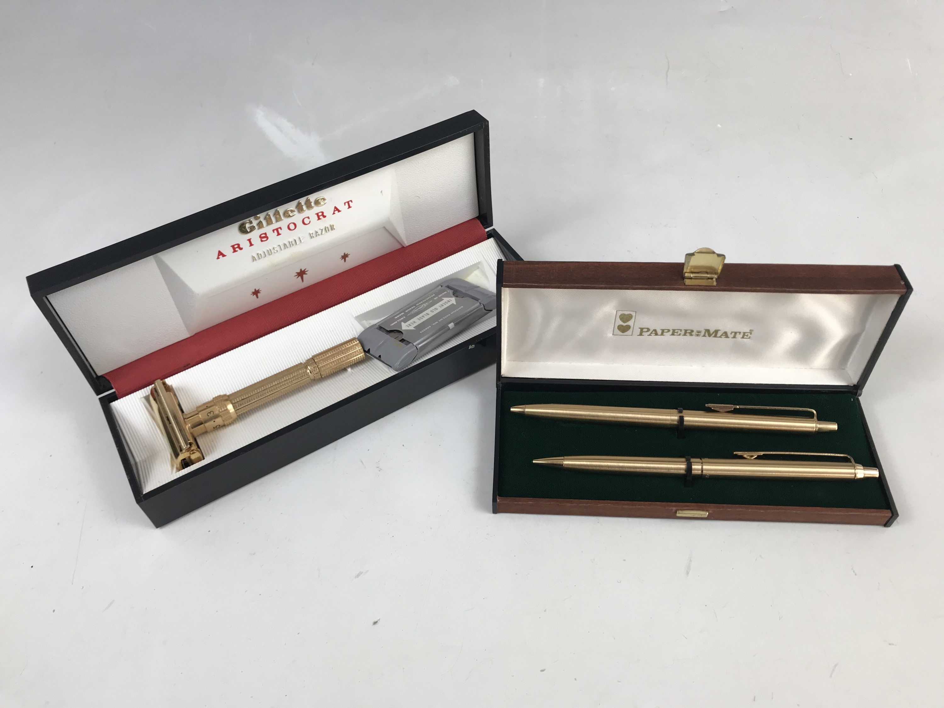 A 1960s Gillette Aristocrat razor and a cased Papermate pen set