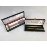 A 1960s Gillette Aristocrat razor and a cased Papermate pen set
