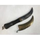 A Victorian sporting / tool knife having curved double-edged blade and horn grip with brass pommel
