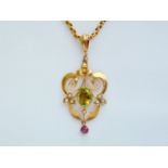 An early 20th Century Suffrage Movement peridot, amethyst and pearl pendant necklace, in an openwork