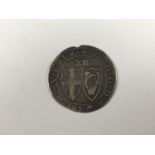 A Charles I hammered silver Commonwealth shilling coin, mint mark Sun (1649)