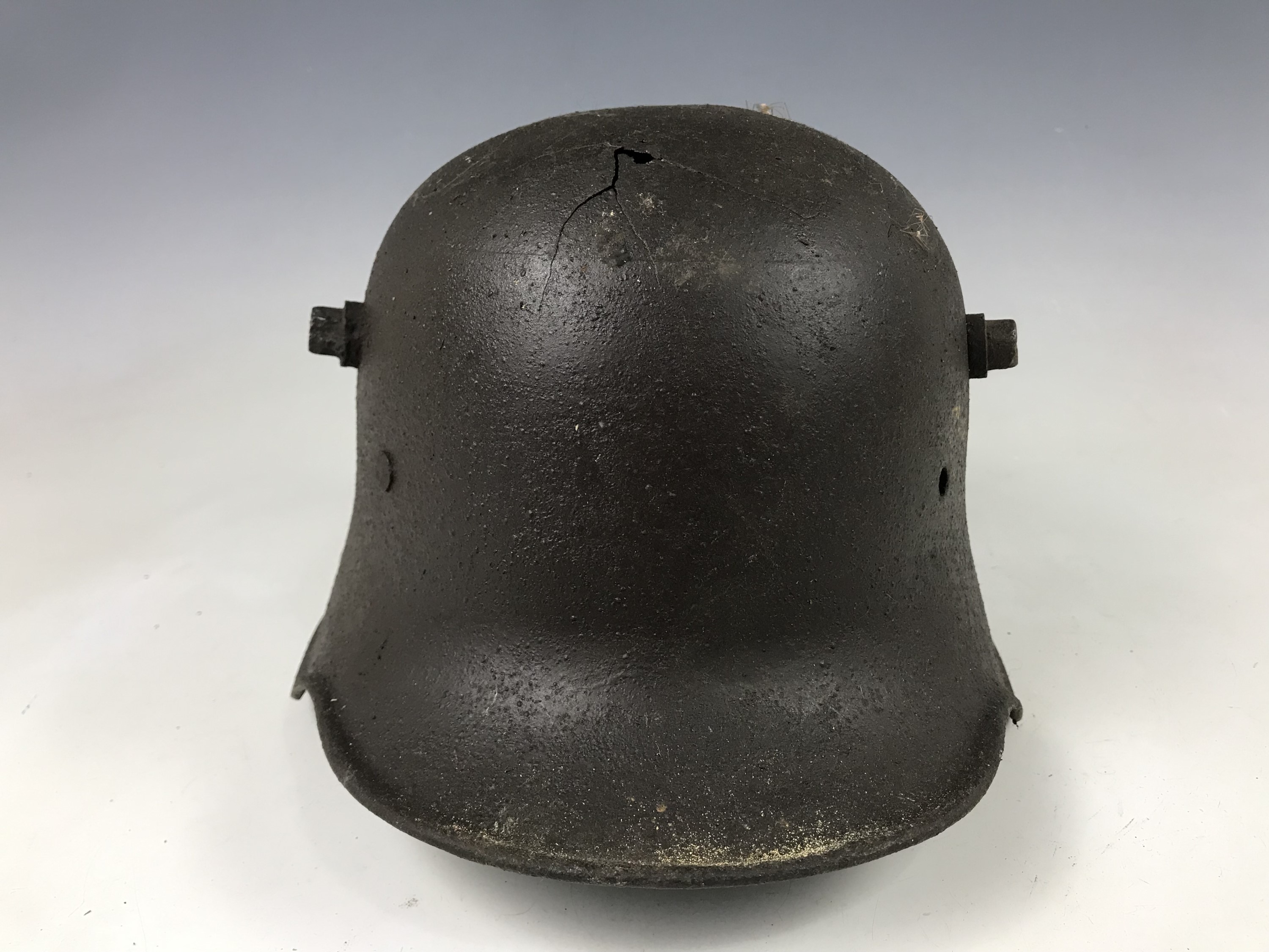 A relic Imperial German steel helmet exhibiting fractures - Image 2 of 5