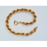 A 9ct gold rope-link bracelet, 7.6g