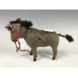 A vintage Triang Minic clockwork donkey, 11 cm