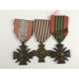Three French medals: a 1939 Croix de Guerre, a Theatres d'Operations Exterieurs medal and a Croix du