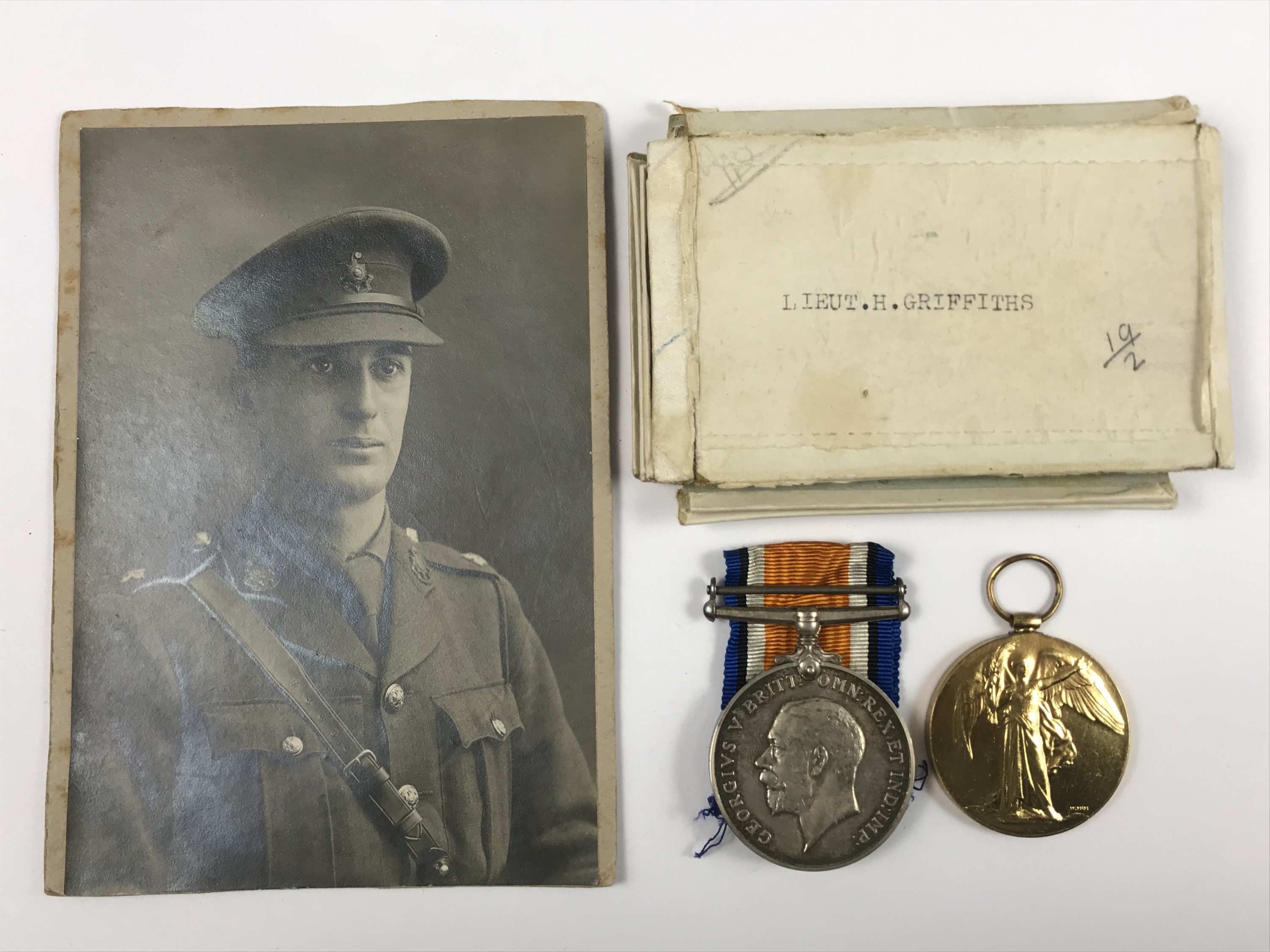 A British War and Victory Medal pair to Lieutenant H Griffiths, Royal Sussex Regiment together