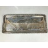 An early 20th Century Bohemian white-metal serving tray by Frantisek Bibus, of oblong section,