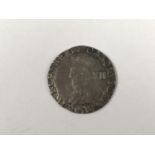 A Charles I hammered silver shilling coin, mint mark Crown (1635-6)