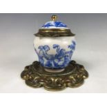 A late 19th / early 20th Century gilt-metal mounted Sevres blue-and-white porcelain ink bottle,