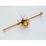 A Victorian yellow-metal citrine and sapphire spider brooch retailed by Cornelius Desormeaux