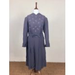 A 1940s dark periwinkle-blue crepe day dress, having piped V neckline, puffed full-length sleeves