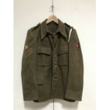 An inter-War Royal Artillery sergeant's service dress tunic bearing Bhurtpore Garrison embroidered