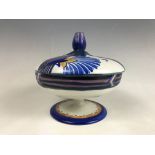 A 1930s Carlton Ware Flowering Papyrus pattern footed dish with cover, of oblate form, having a