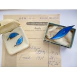 A mid-20th Century Norwegian silver brooch and ear-clip suite by David Andersen, each in the form of