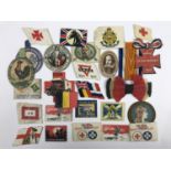A number of Great War Flag Day pin badges and related items
