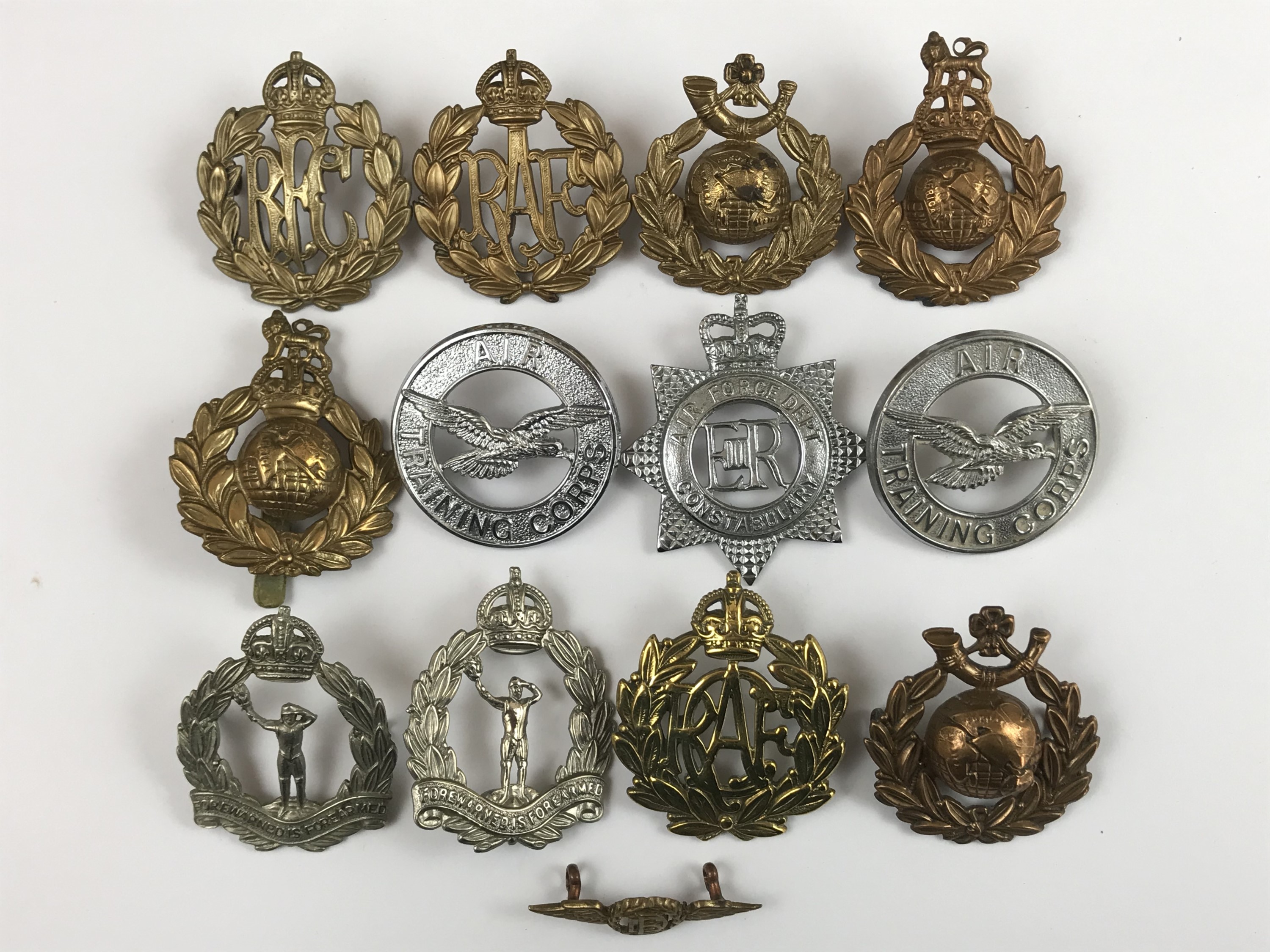 A quantity of air force and marines badges