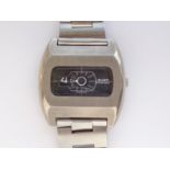 A 1970s Buler Super-Nova stainless steel jump-hour mechanical wrist watch