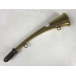 An antique brass horn retailed by J Tournier of Paris, 27 cm