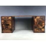 A late Meiji / Taisho Japanese kodansu cabinet / miniature kneehole desk, parquetry veneered