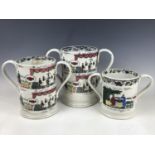 A set of three early 19th Century graded pearlware loving cups, transfer printed and hand-tinted