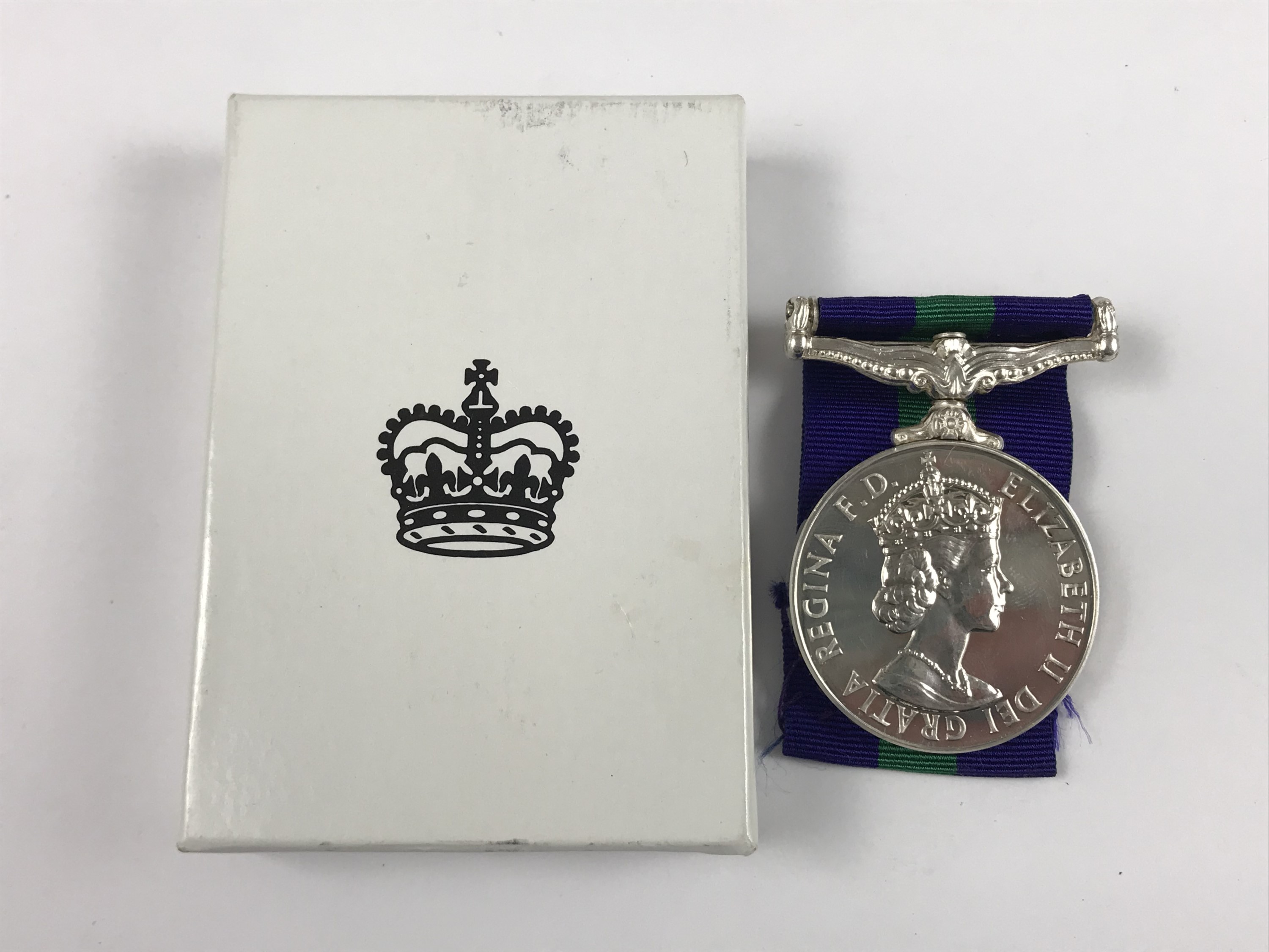 A Queen Elizabeth II General Service medal with Canal Zone clasp to AC1 E Graham (4083377) RAF, in